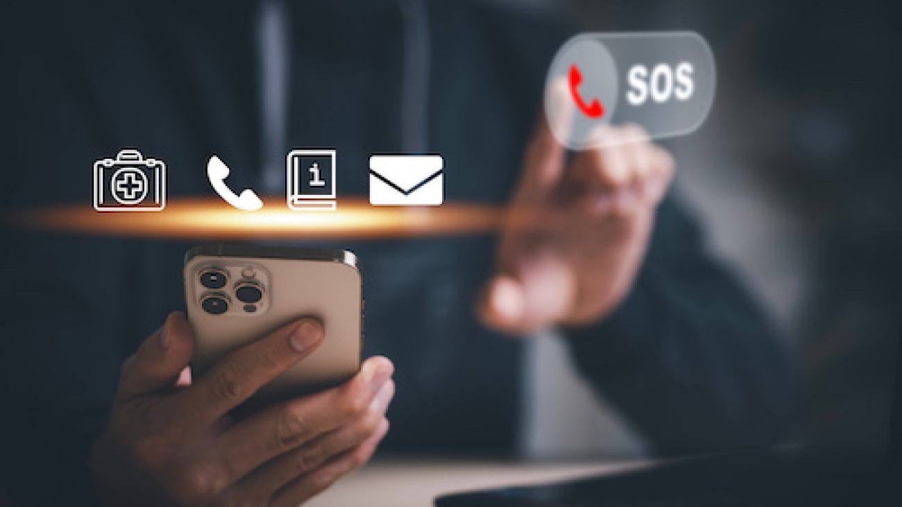 Hand touch button Emergency app in home, call phone, Chat message icon, Emergency application from smartphone for elderly, technology concept.Old hand touch mobile phone and call for help.