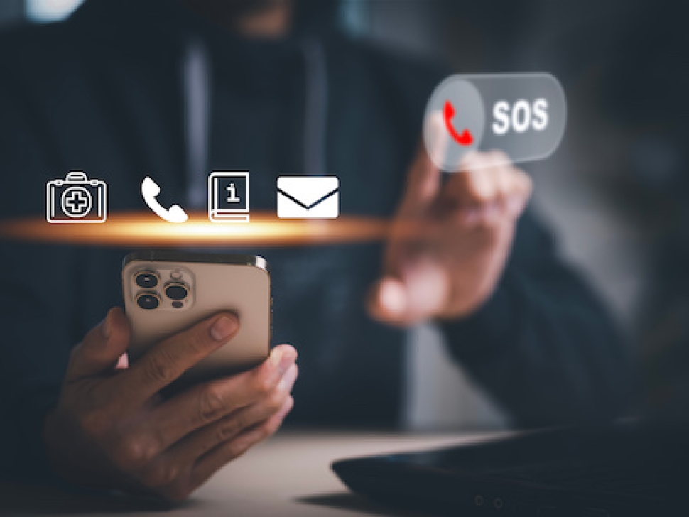 Hand touch button Emergency app in home, call phone, Chat message icon, Emergency application from smartphone for elderly, technology concept.Old hand touch mobile phone and call for help.